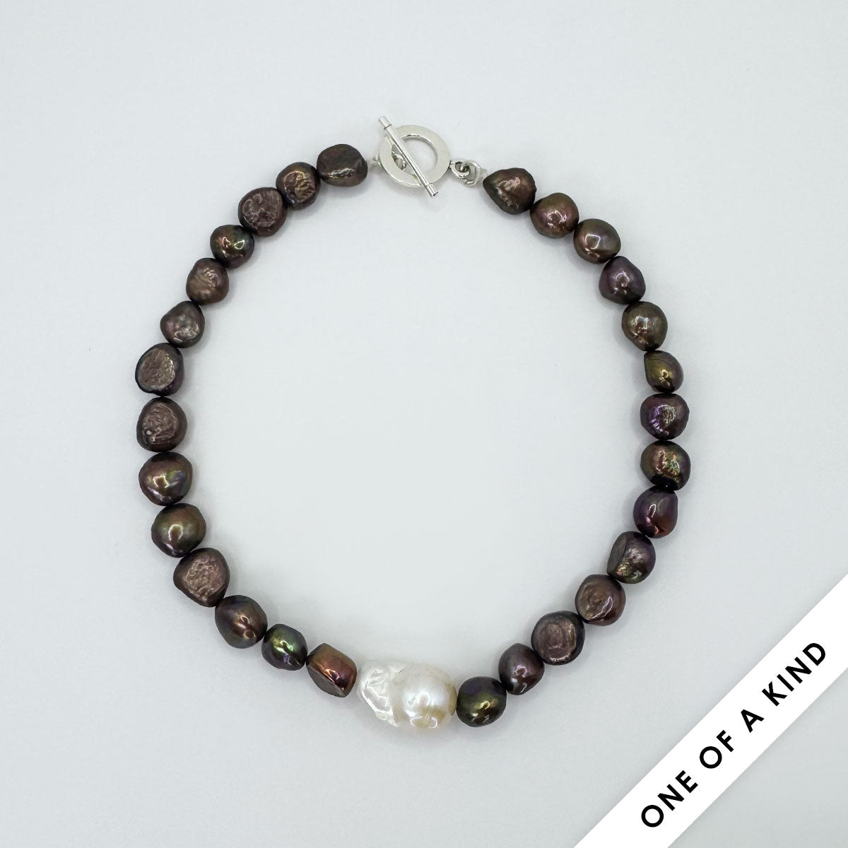 Collar perlas cafe con perla chunky.