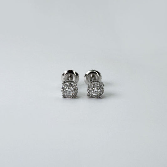 Broqueles solitario con diamantes.