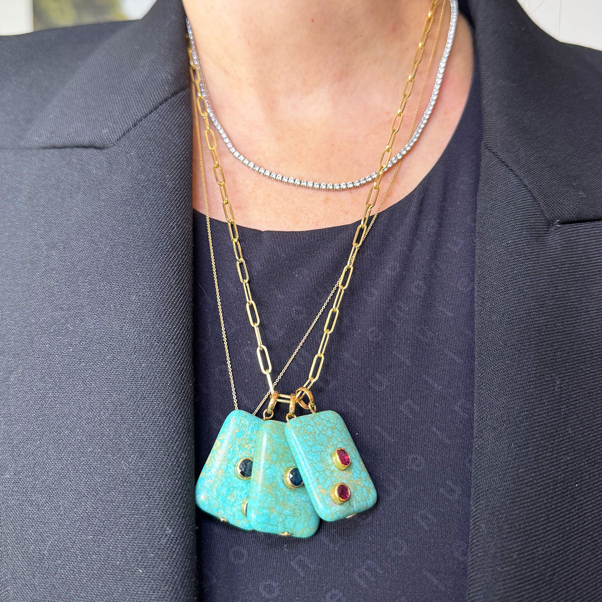 Dije turquesa Galáctica con rubíes Mod.5