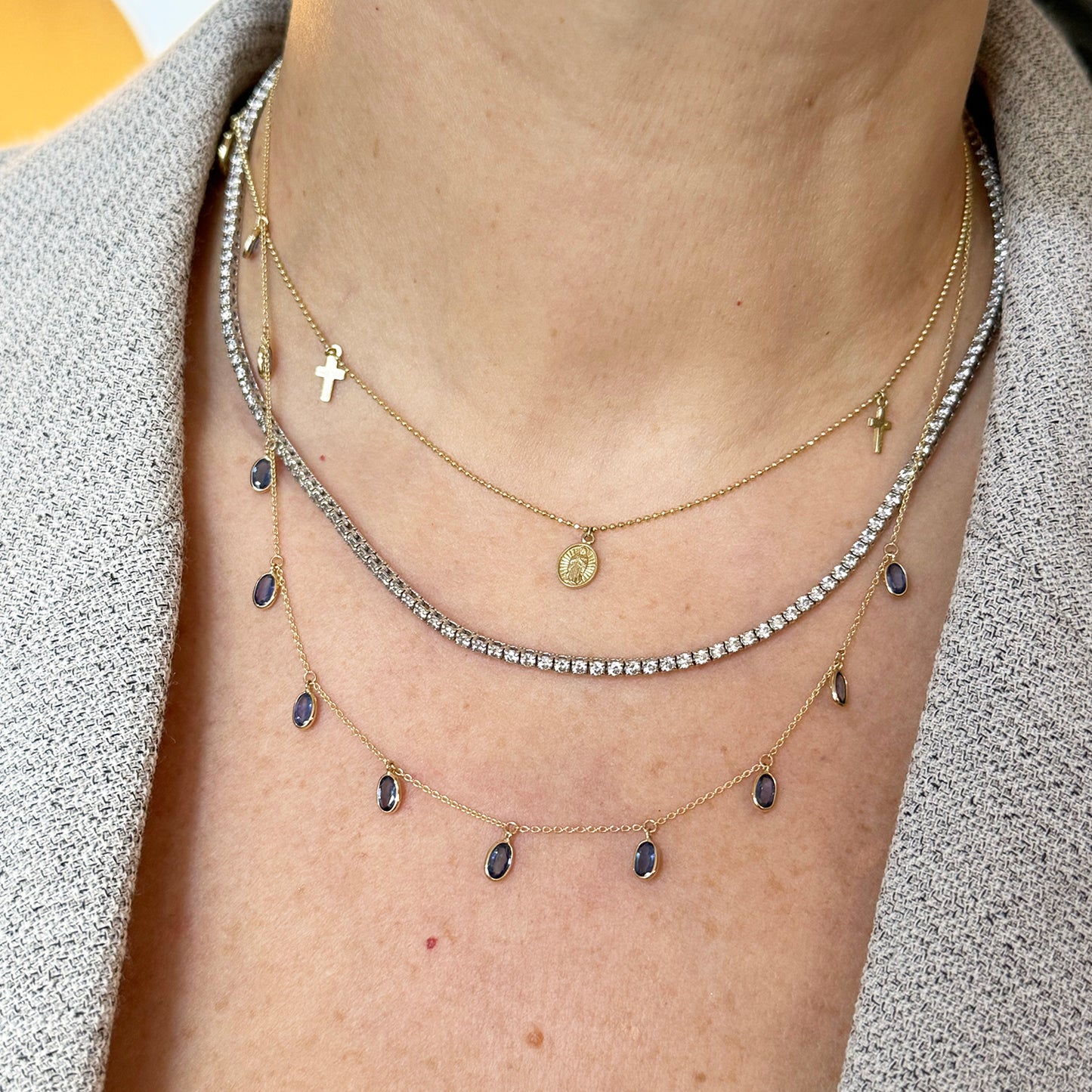 Collar zafiros oval lluvia oro.