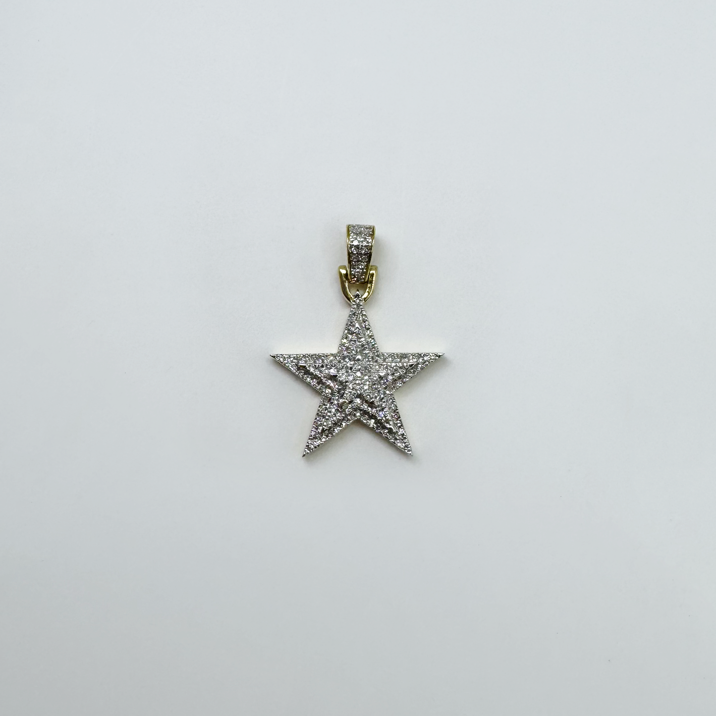 Dije estrella (triple) oro y diamantes