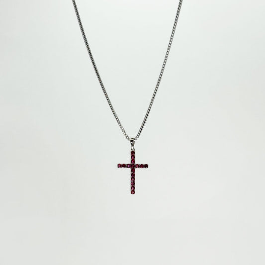 Collar cruz rubí.