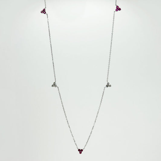 Collar flor rubíes y diamantes.