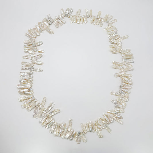 Collar perlas stick.