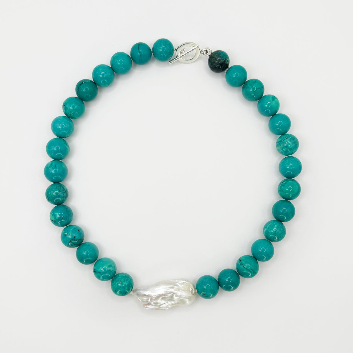 Collar turquesa aqua con perla cultivada barroca.