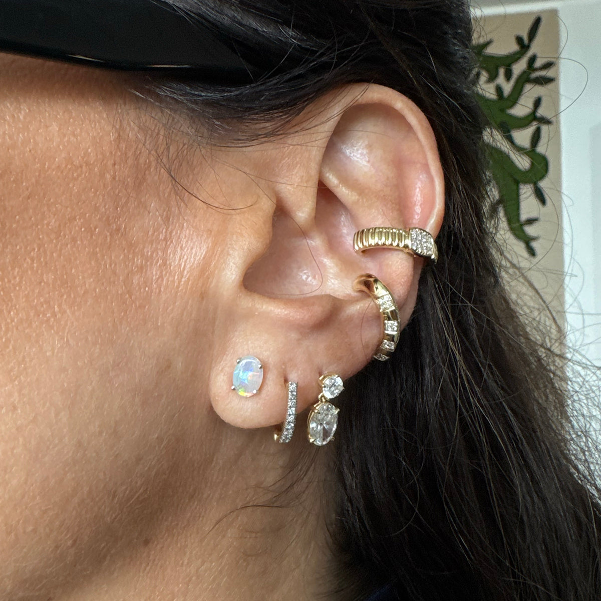 Aretes ópalo en oro.