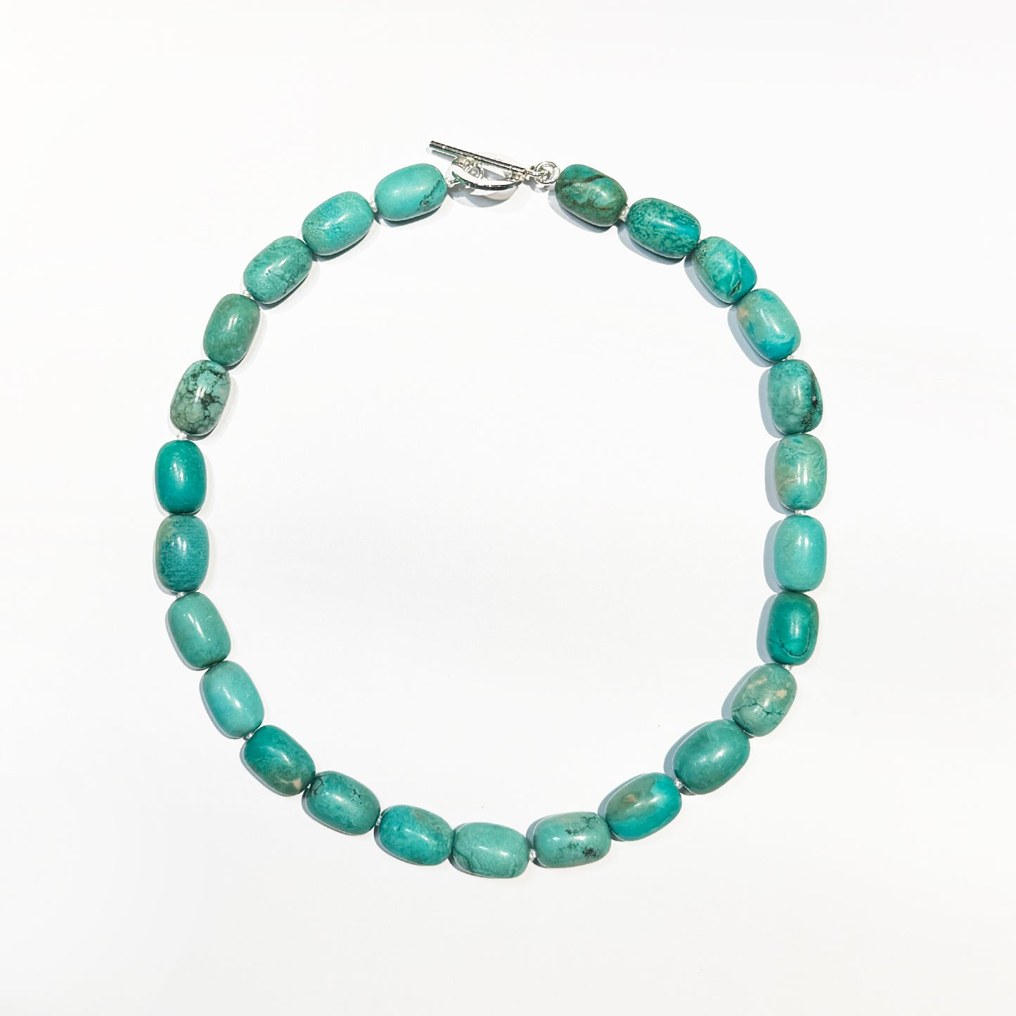 Collar turquesa.