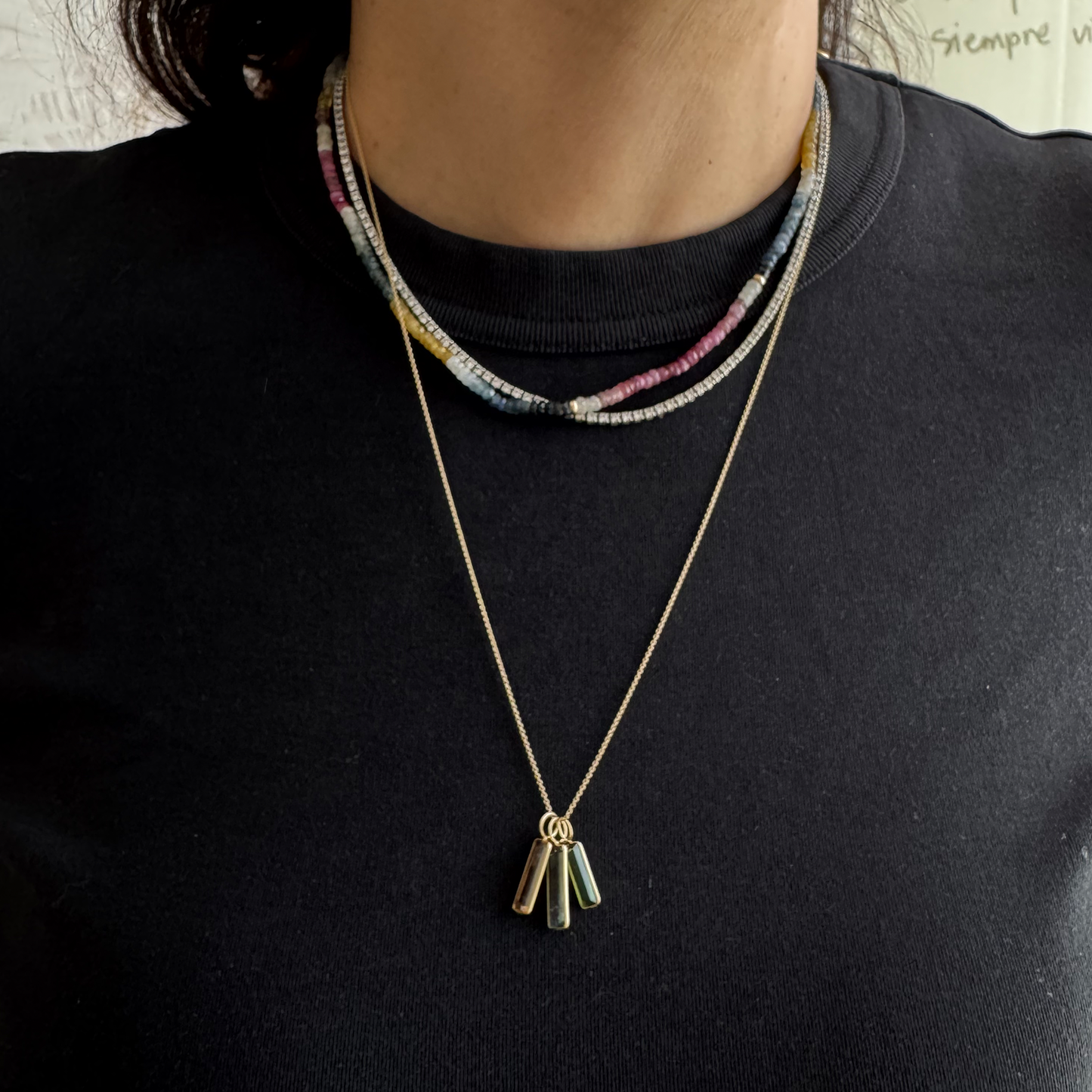 Dije turmalina y oro.