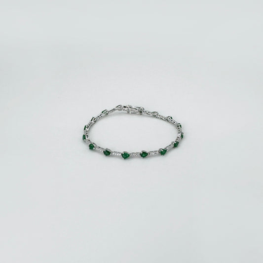 Pulsera esmeraldas con diamantes oro blanco.