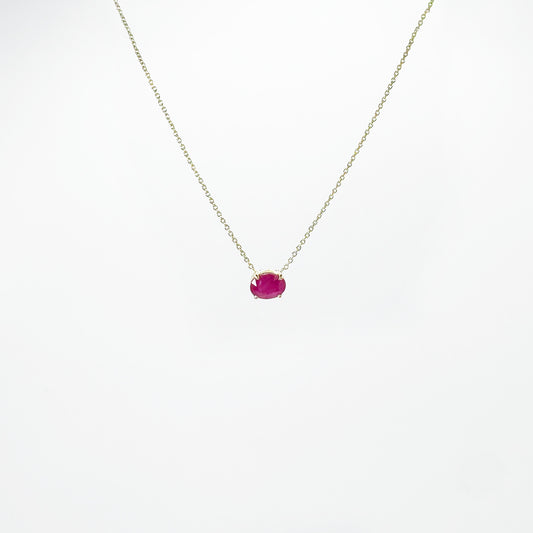 Collar rubí oval oro.