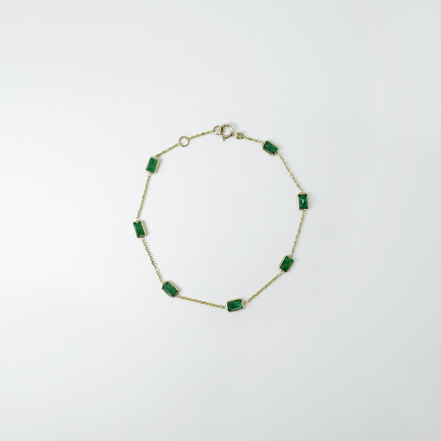 Pulsera esmeraldas cadena oro.