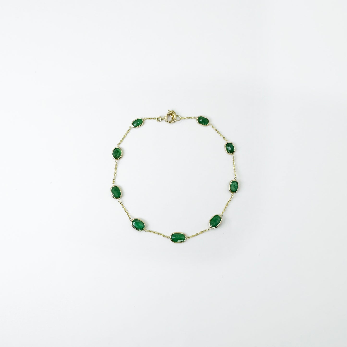 Pulsera esmeraldas oval cadena oro.