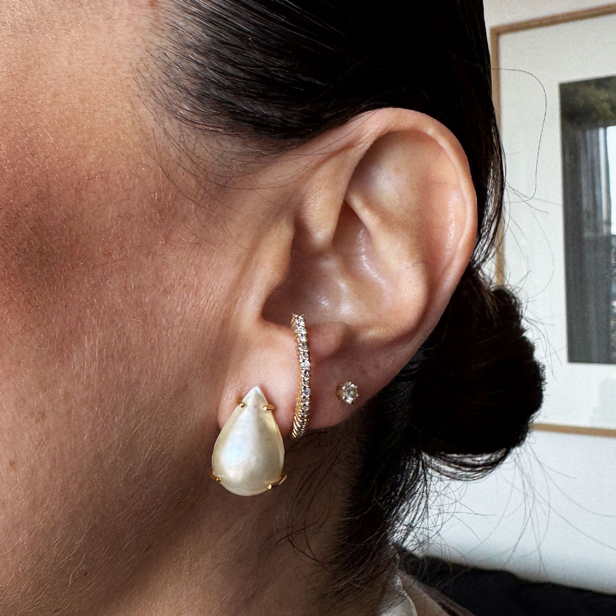 Aretes gota madreperla montados en oro