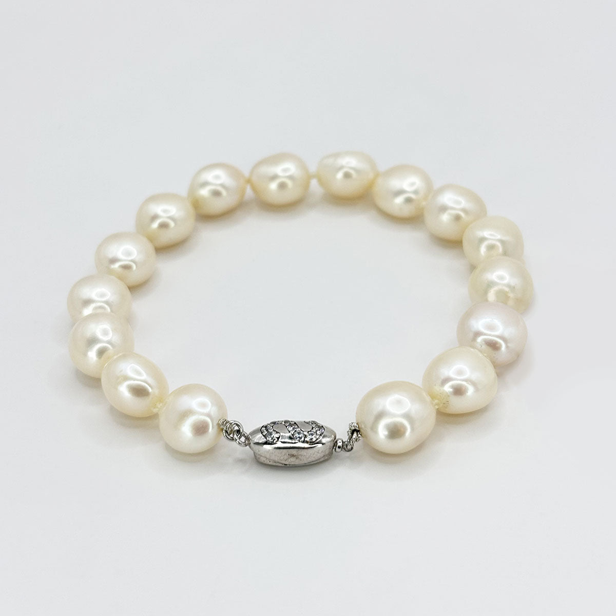 Pulsera perlas.