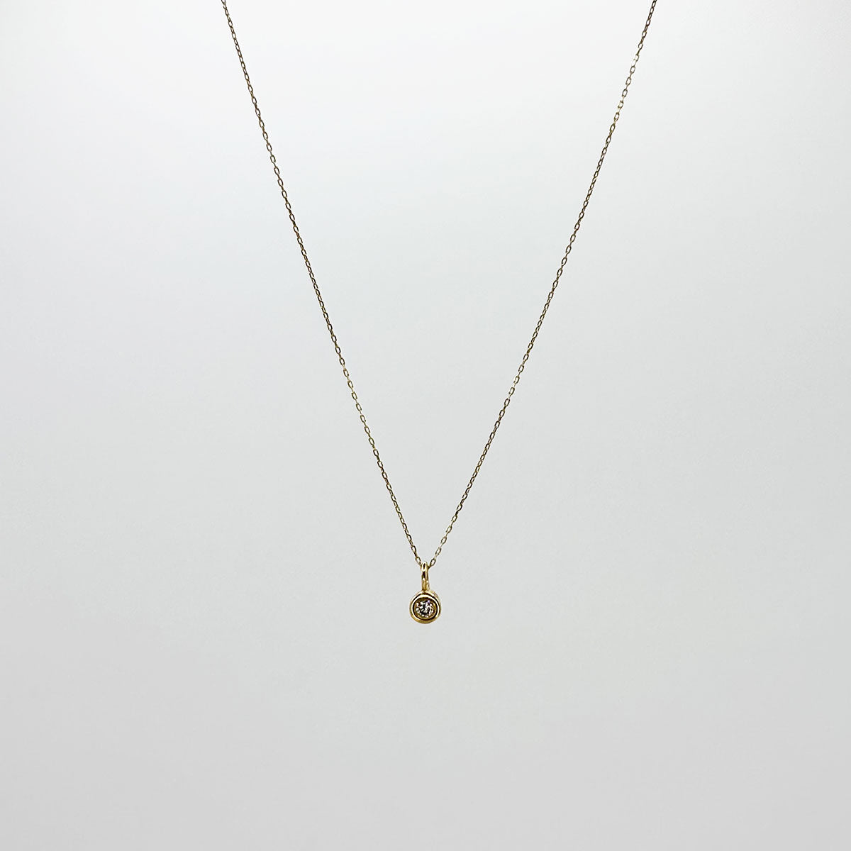 Collar diamante solitario mini.