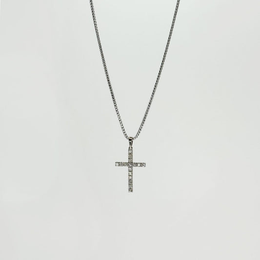 Collar cruz diamante oro blanco.