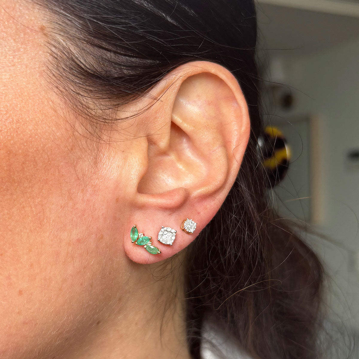 Aretes triple esmeralda.
