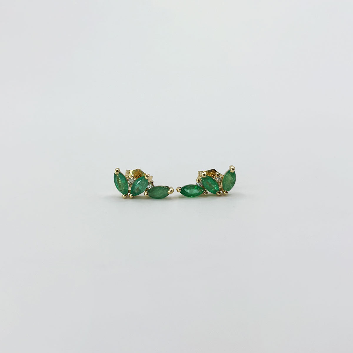 Aretes triple esmeralda.