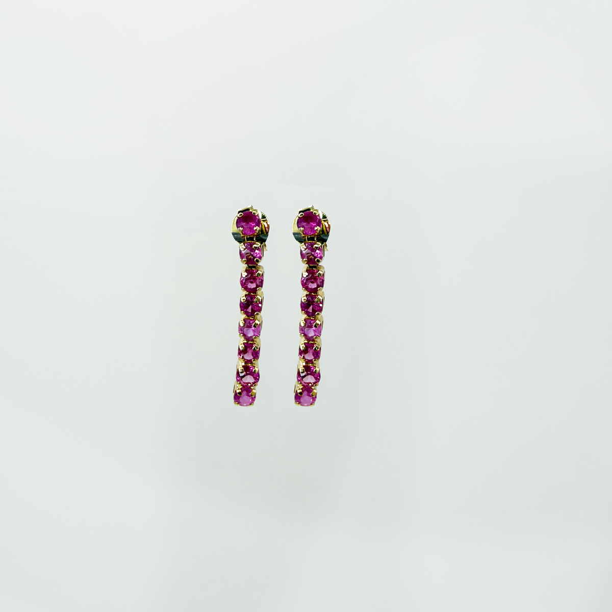 Aretes colgantes rubíes en oro 14k M