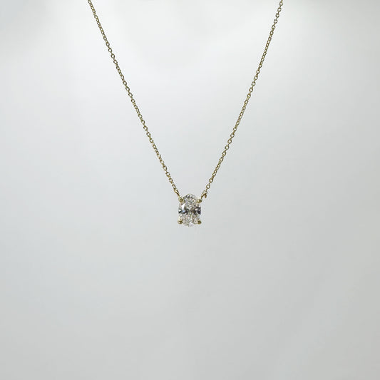 Collar diamante oval con cadena oro amarillo .5 cts.