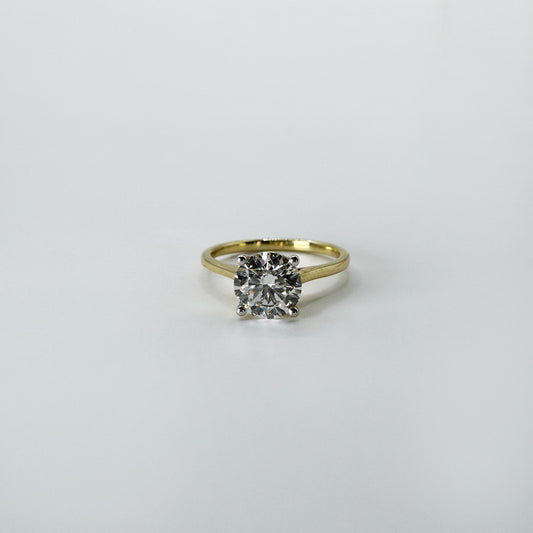 Anillo diamante redondo oro amarillo 1.5 cts.