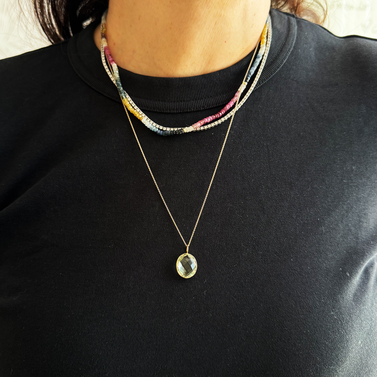 Dije amatista y oro.