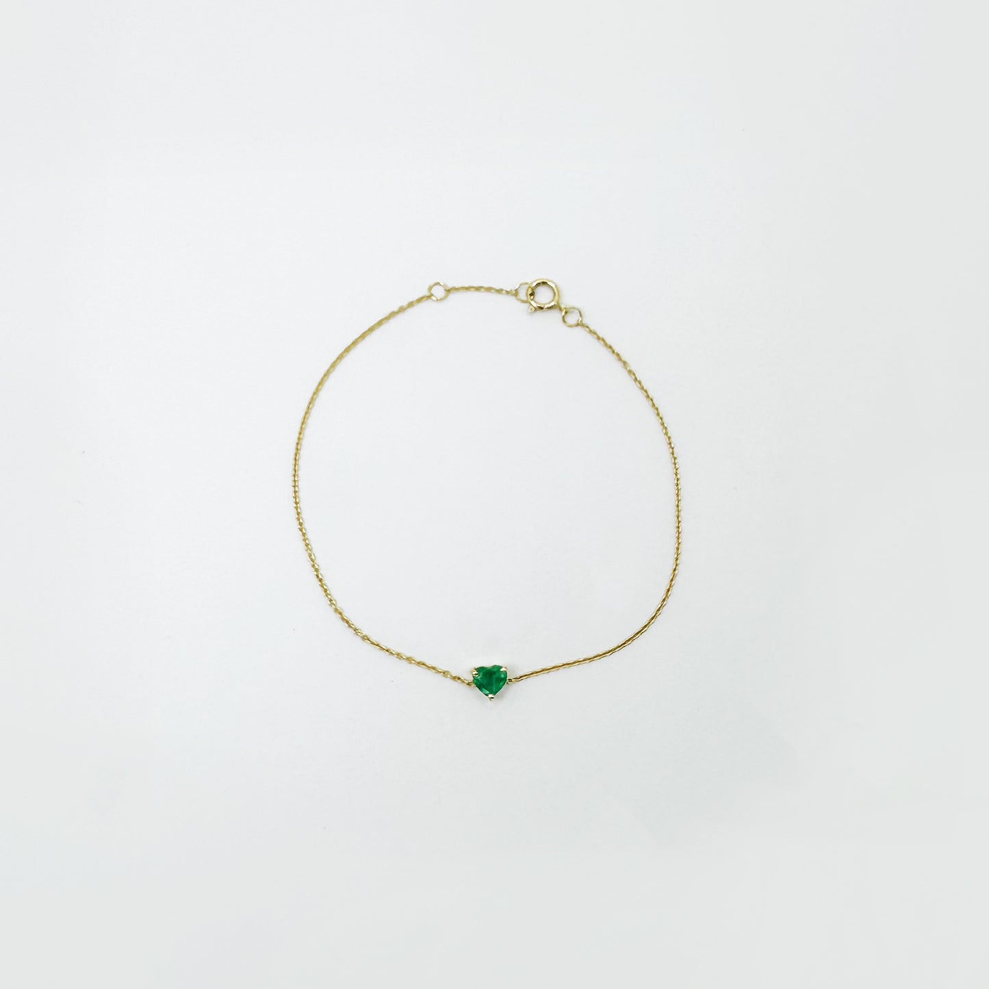Pulsera esmeralda corazón oro.