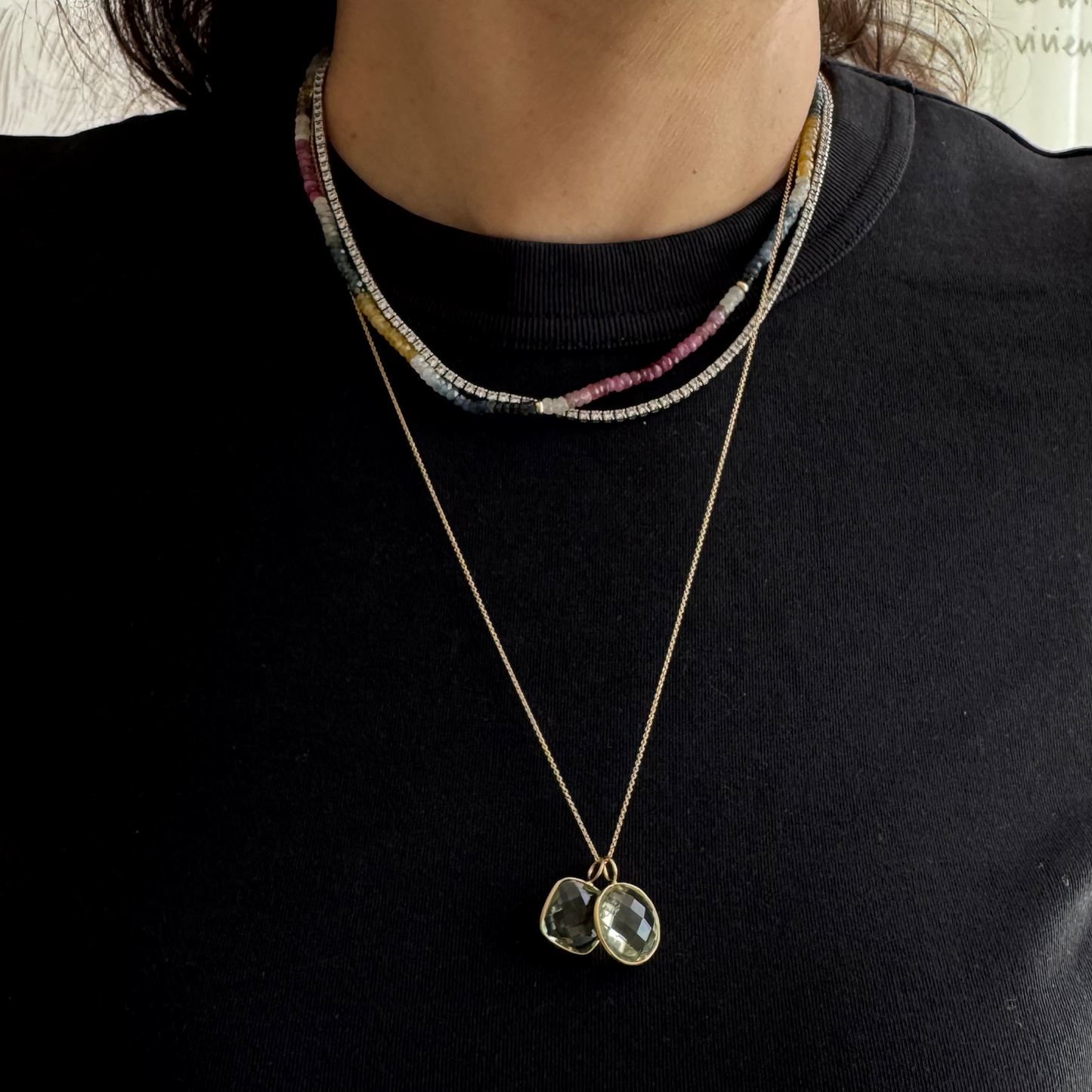 Dije amatista y oro.