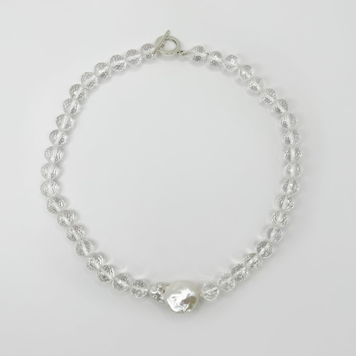 Collar cristal de roca y perla cultivada barroca.