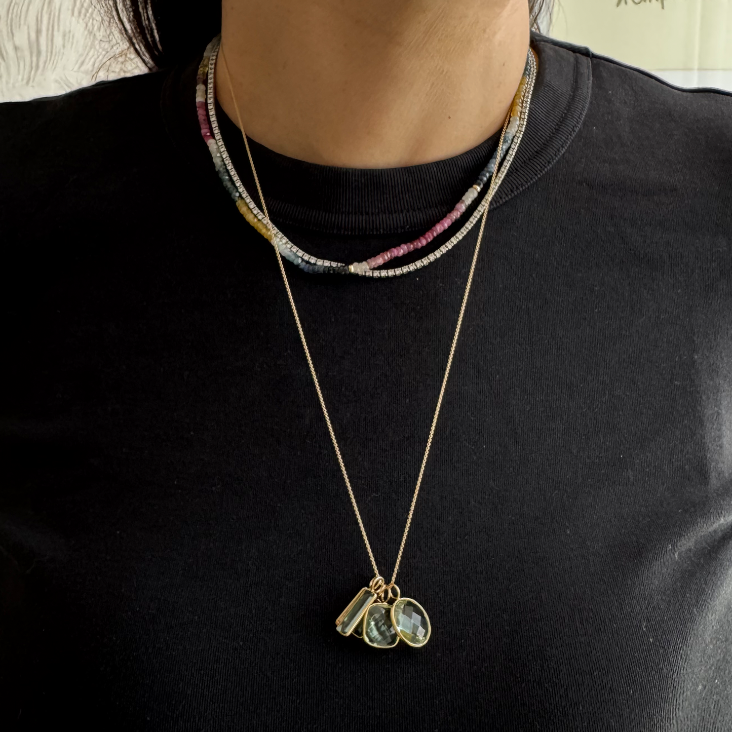 Dije amatista y oro.