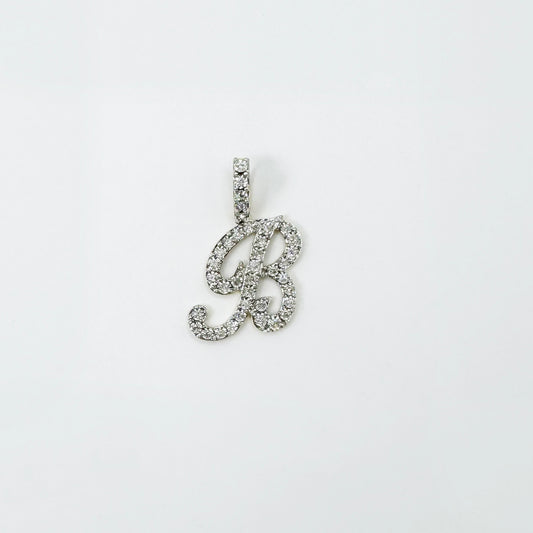Dije letra "B" XL cursiva en oro y diamantes.
