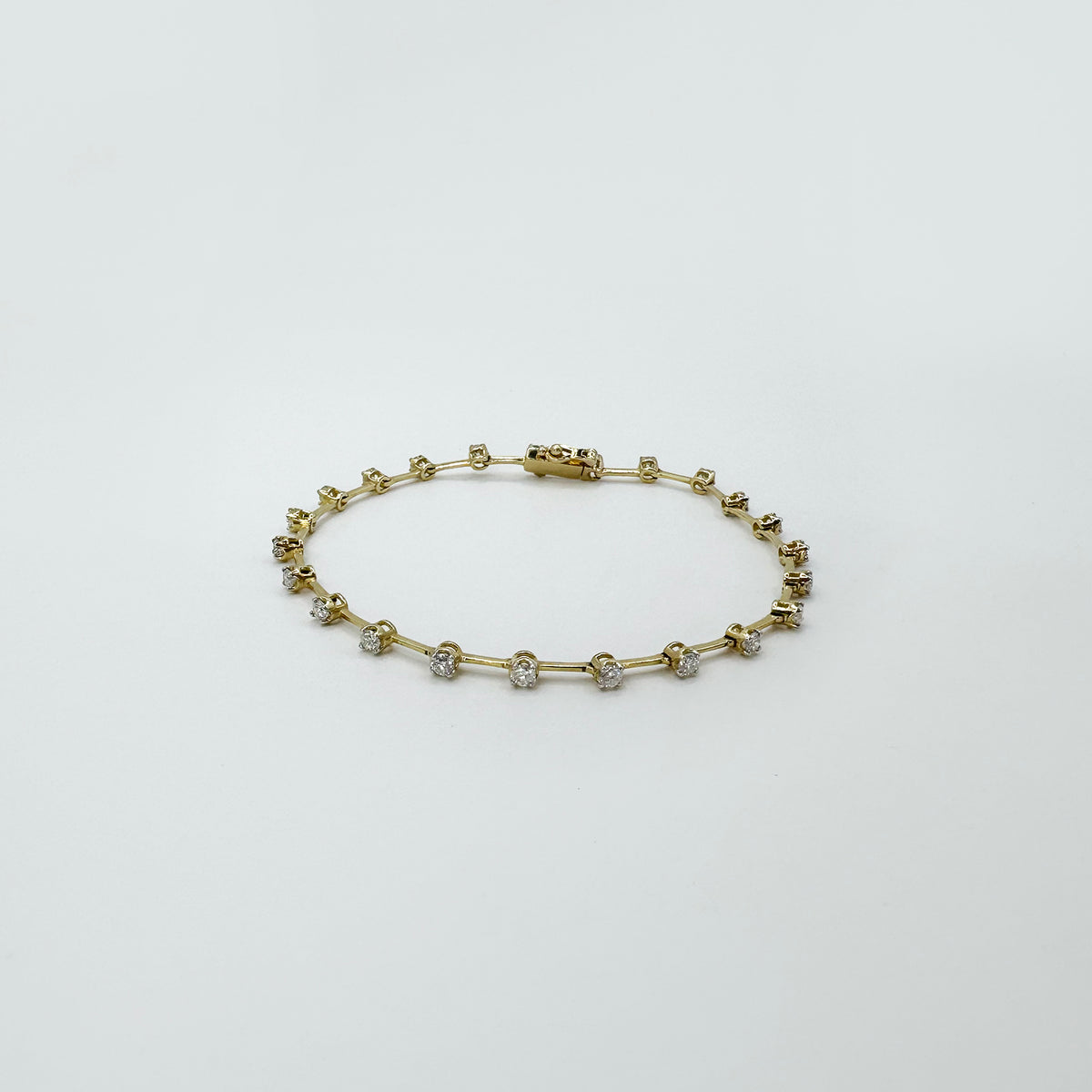 Pulsera tennis diamantes naturales 101 oro amarillo.