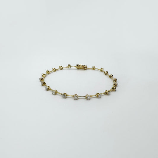 Pulsera tennis diamantes naturales 101 oro amarillo.