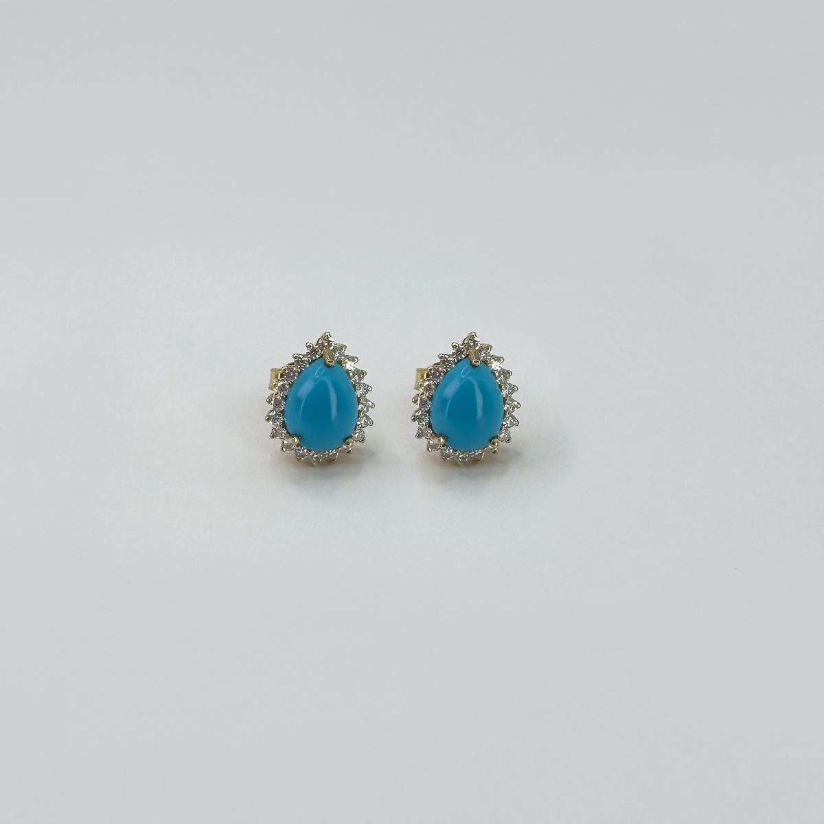 Aretes turquesa gota con halo diamantes naturales, oro 14k.