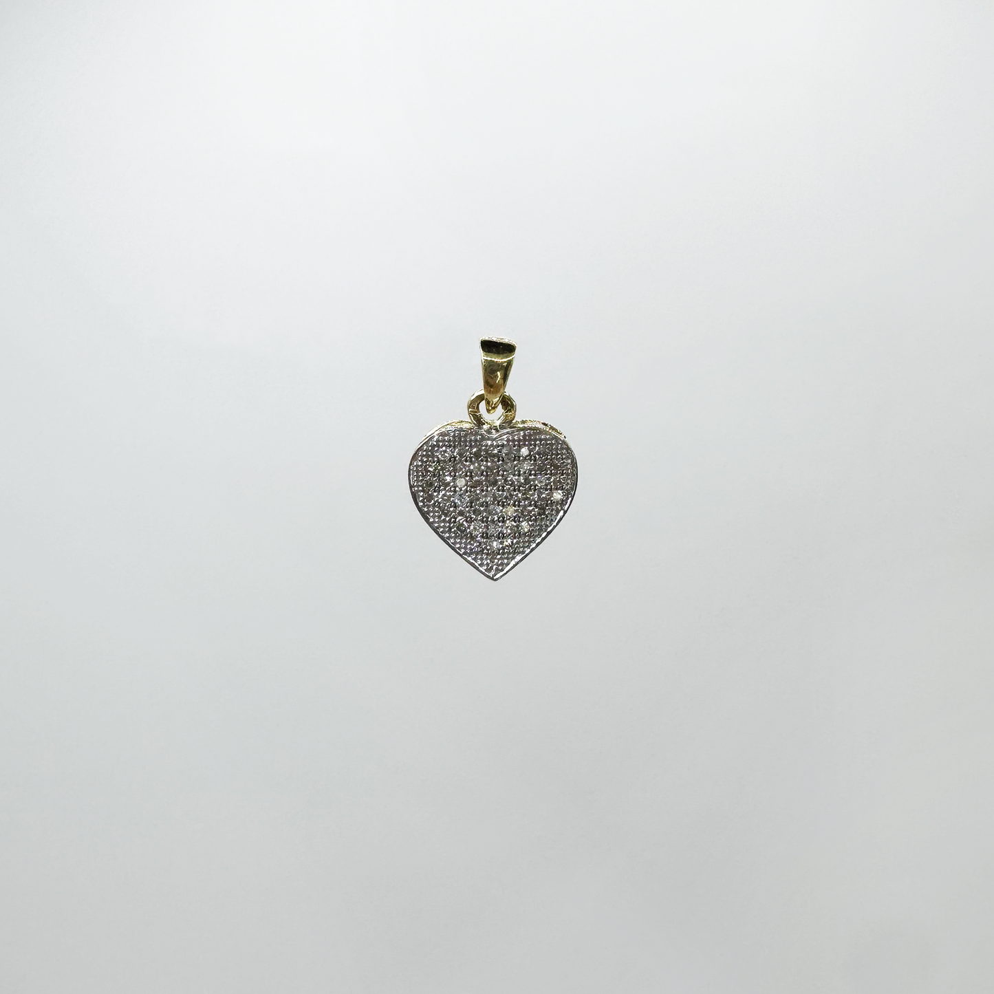 Dije corazón diamantes mediano.