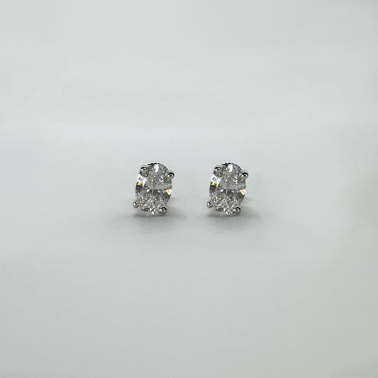 Aretes diamante oro blanco oval 2 cts.
