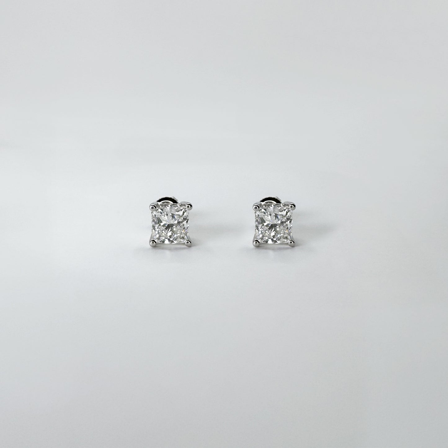 Aretes diamante oro blanco corte princess 2 cts.
