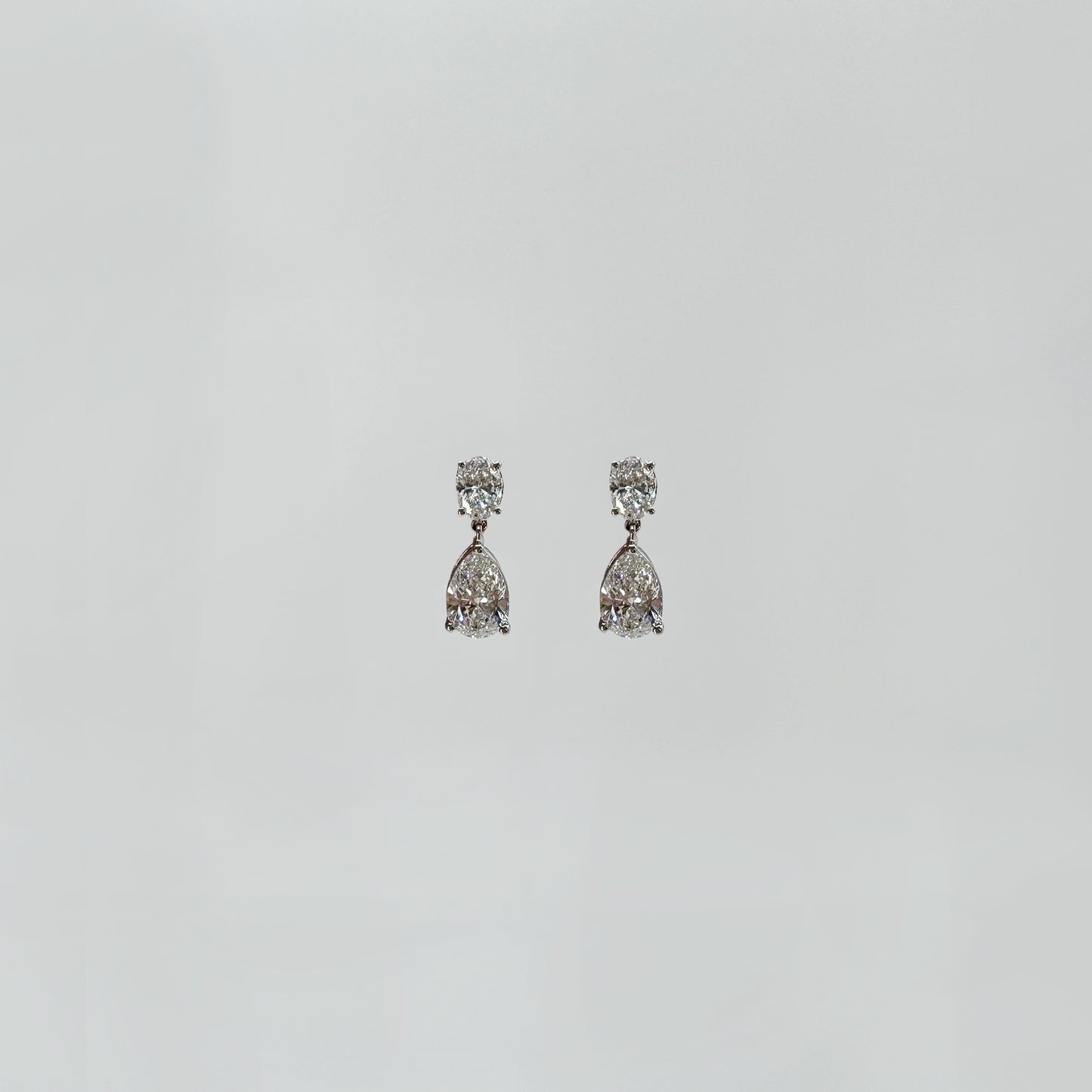 Aretes diamantes pera colagantes 1 ct.