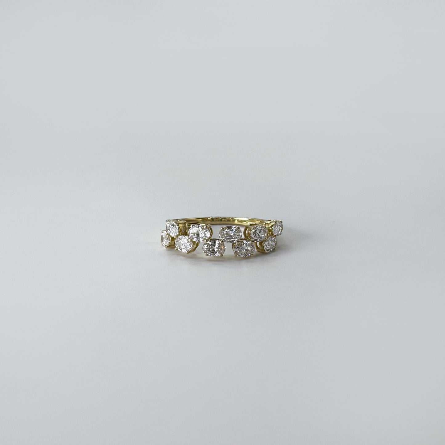 Anillo media churumbela diamantes ovalados zigzag 1 cts oro amarillo