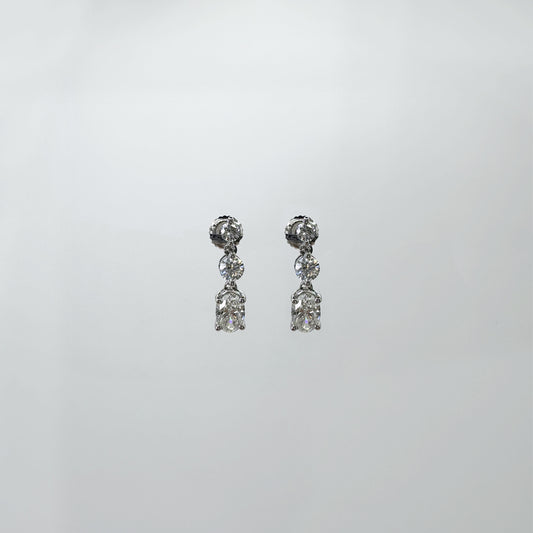 Aretes diamantes colgantes oro blanco 1 cts.