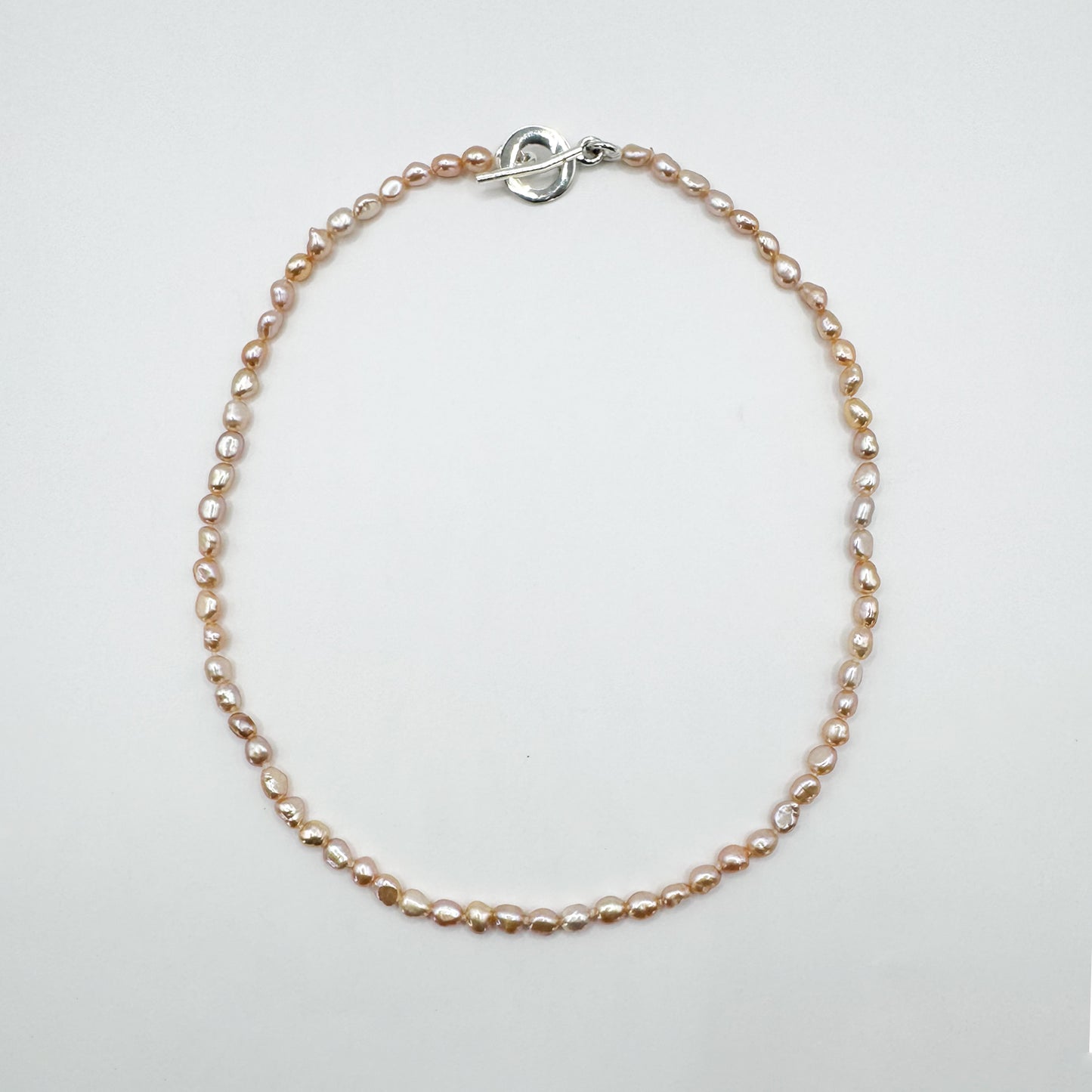 Collar mini keshi salmón 37.