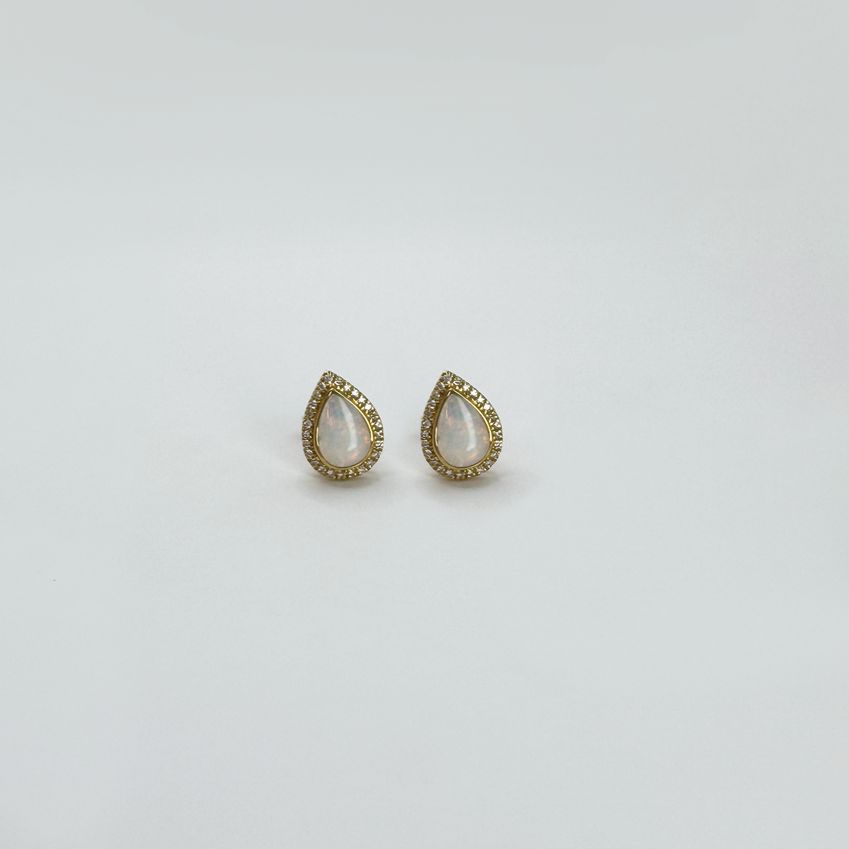 Broqueles ópalo gota con halo diamantes