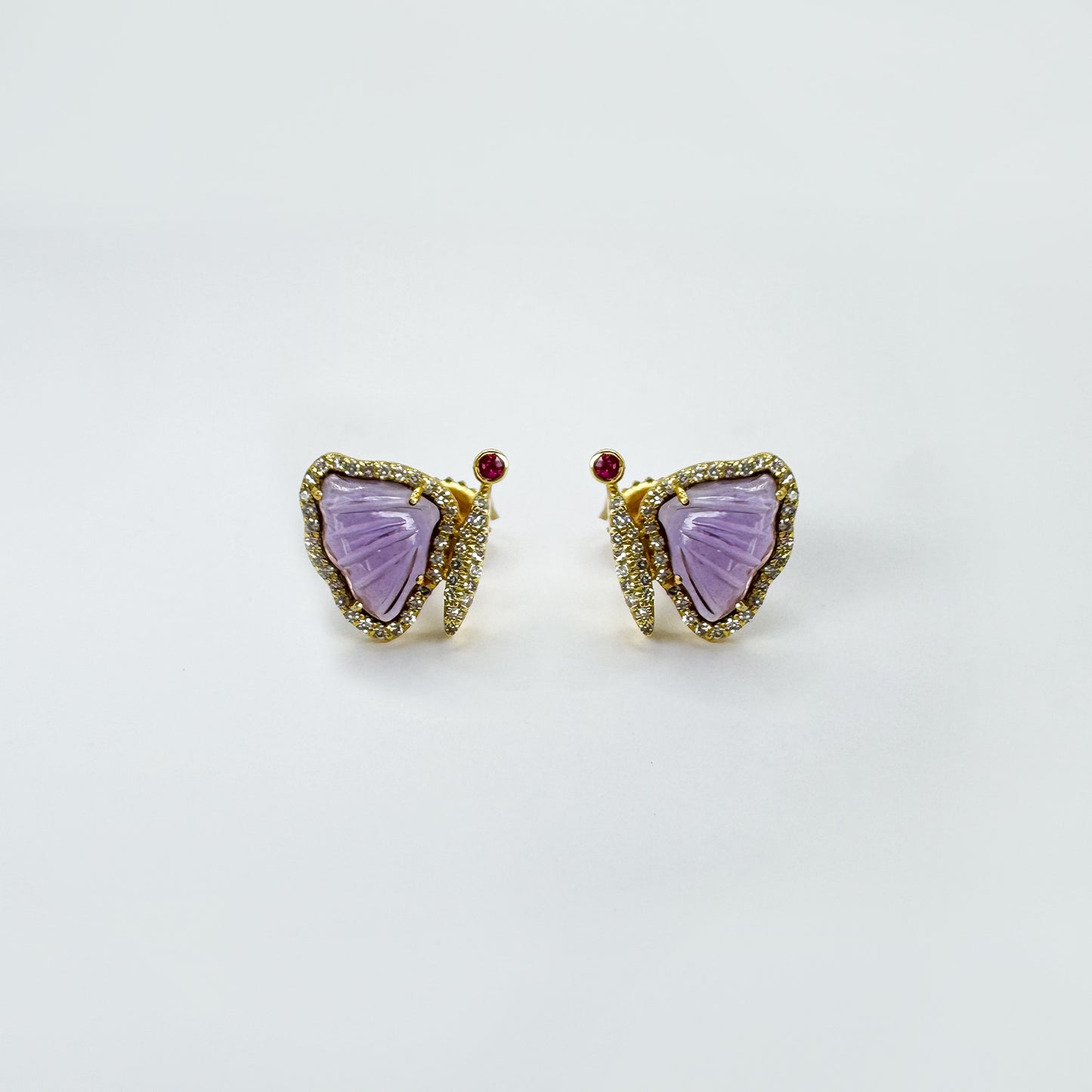 Aretes media mariposa