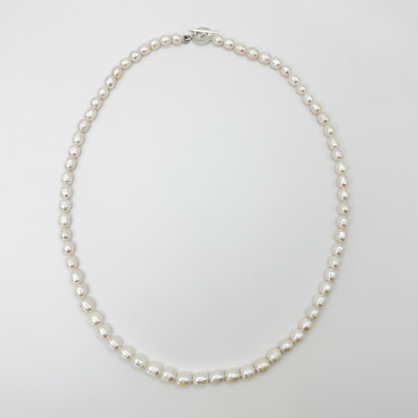 Collar perlas calabacín semi redonda tamaño M.