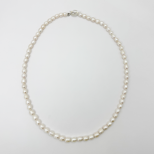 Collar perlas calabacín semi redonda tamaño M.