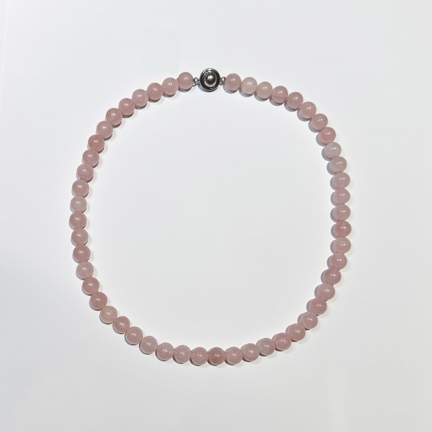 Collar rosa chico.
