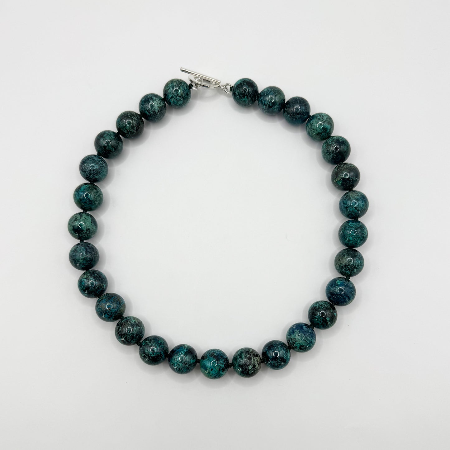 Collar turquesa grande.