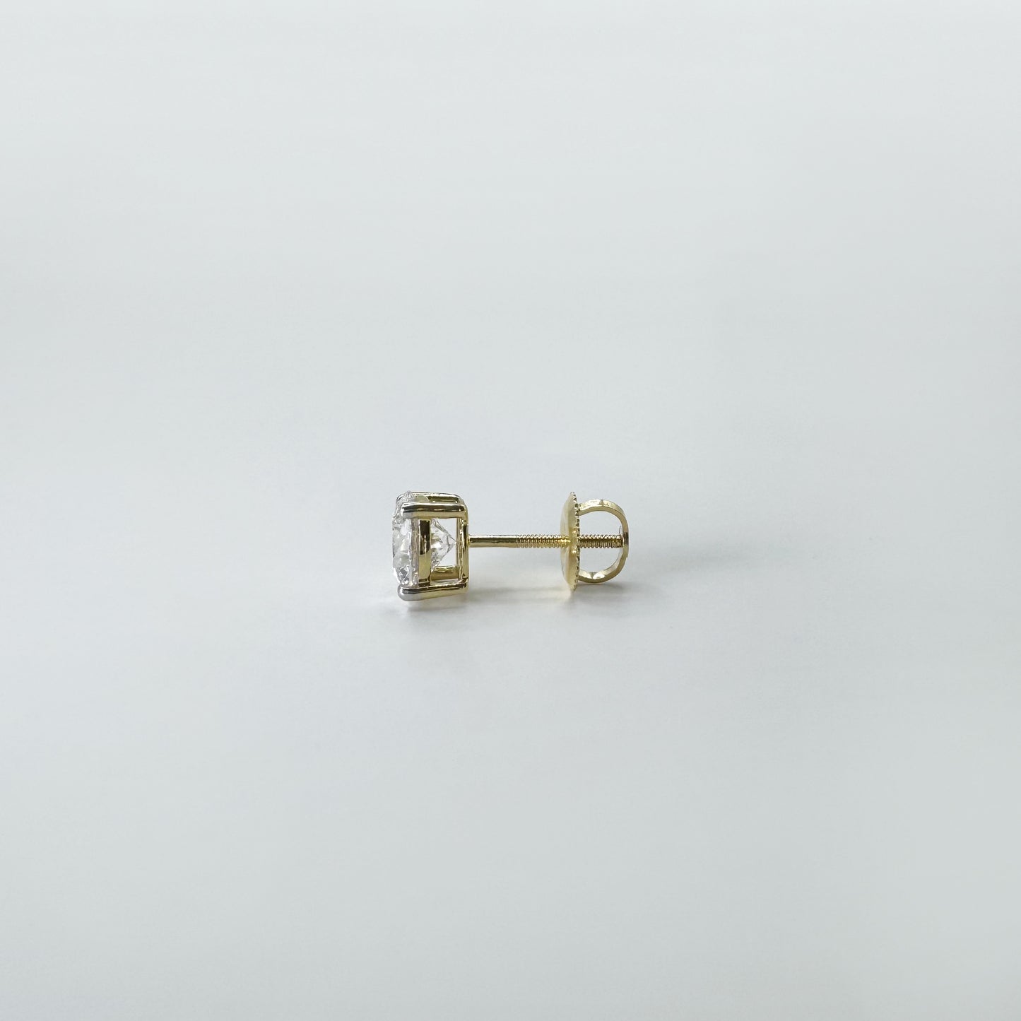 Aretes diamantes redondos oro amarillo 2 cts.
