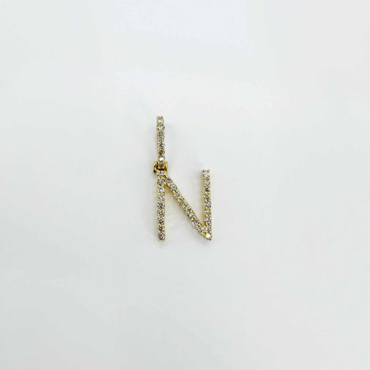 Dije letra "N" Inter Oro Amarillo y diamantes