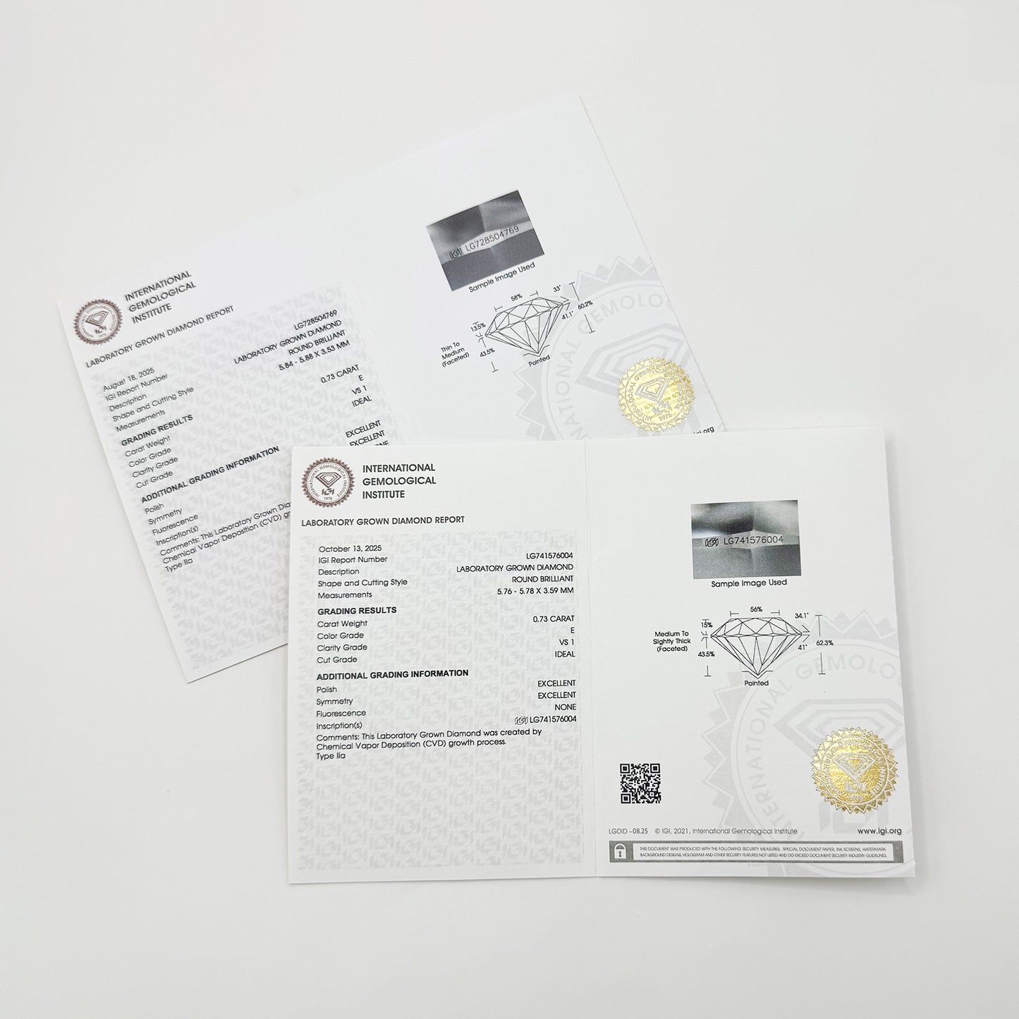 Aretes diamantes redondos oro amarillo 1.5 cts.